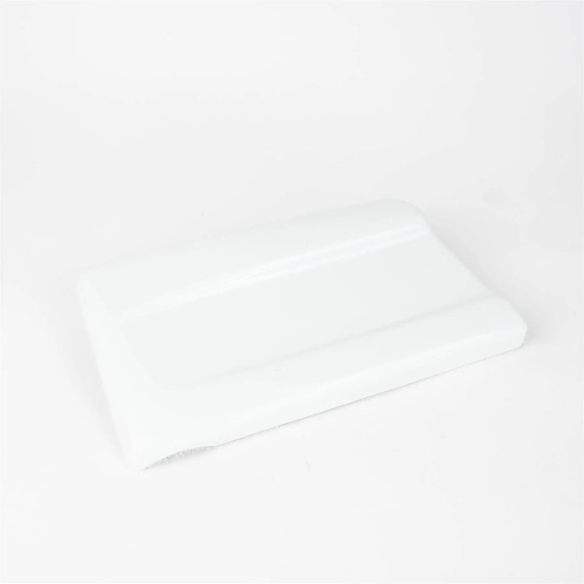 A white AutoQuest motorhome nearside rear skirt cap.