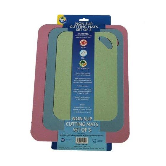 A set of three chopping boards in blue, green, and red.