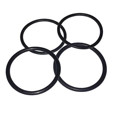 Four black rubber o-rings on a white background