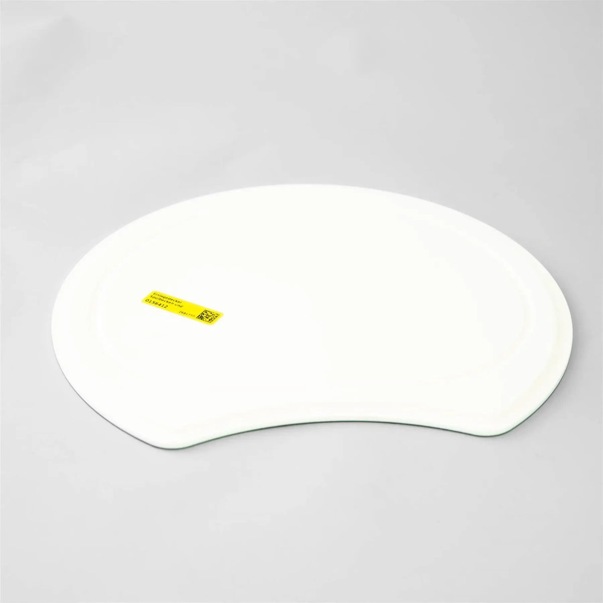 A white Dethleffs motorhome wash basin cover.