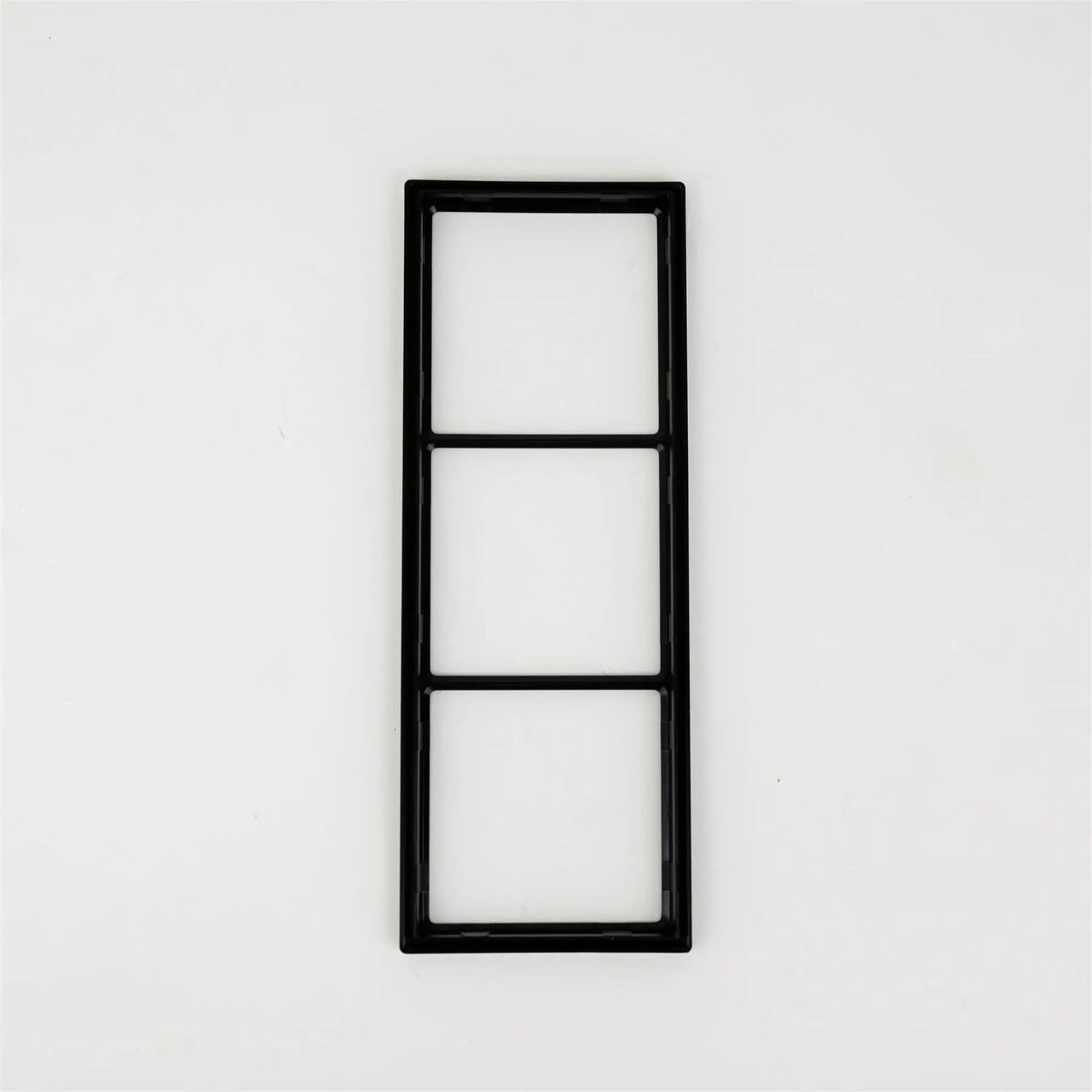 A black Dethleffs three-way socket frame.