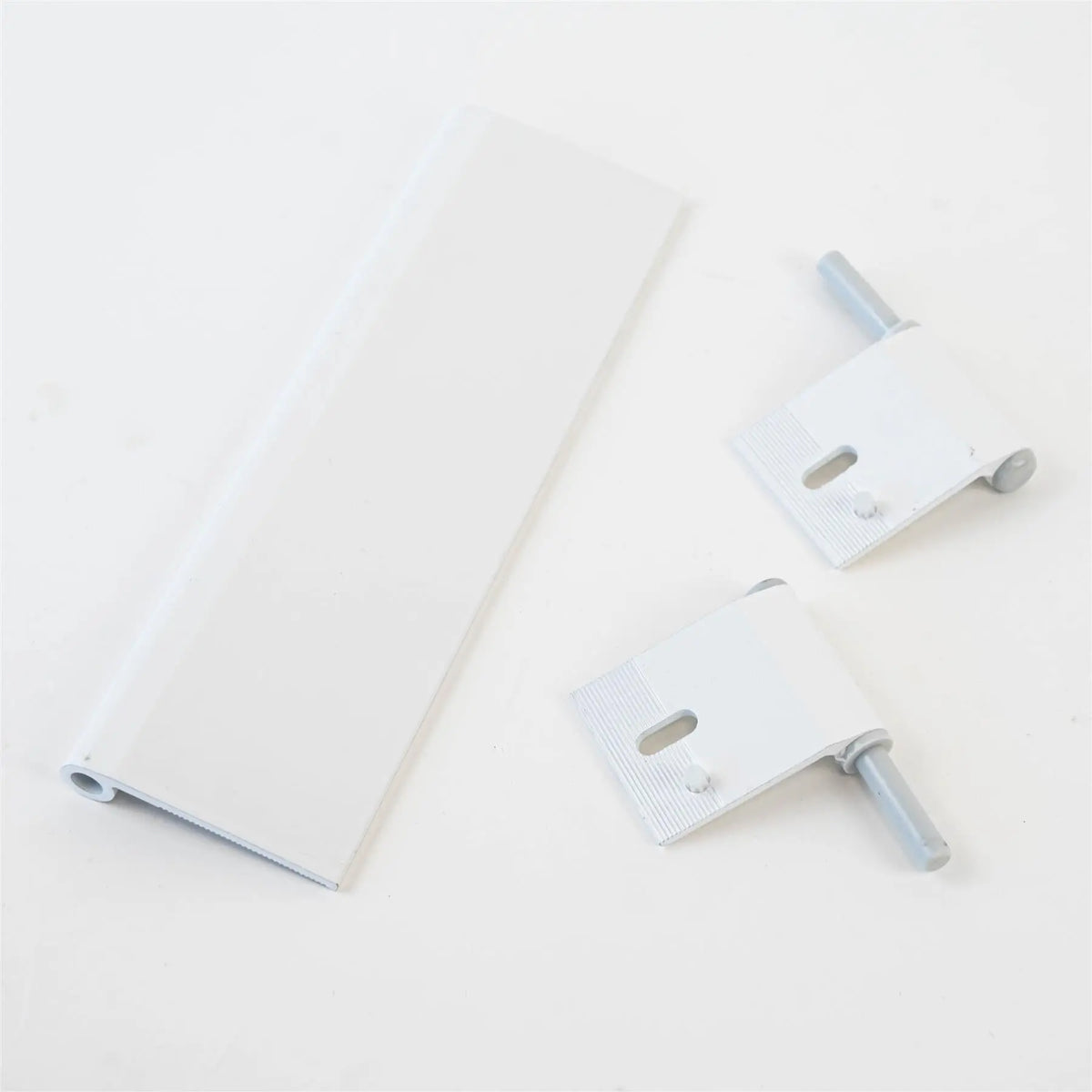 A white Roller Team motorhome garage door hinge.