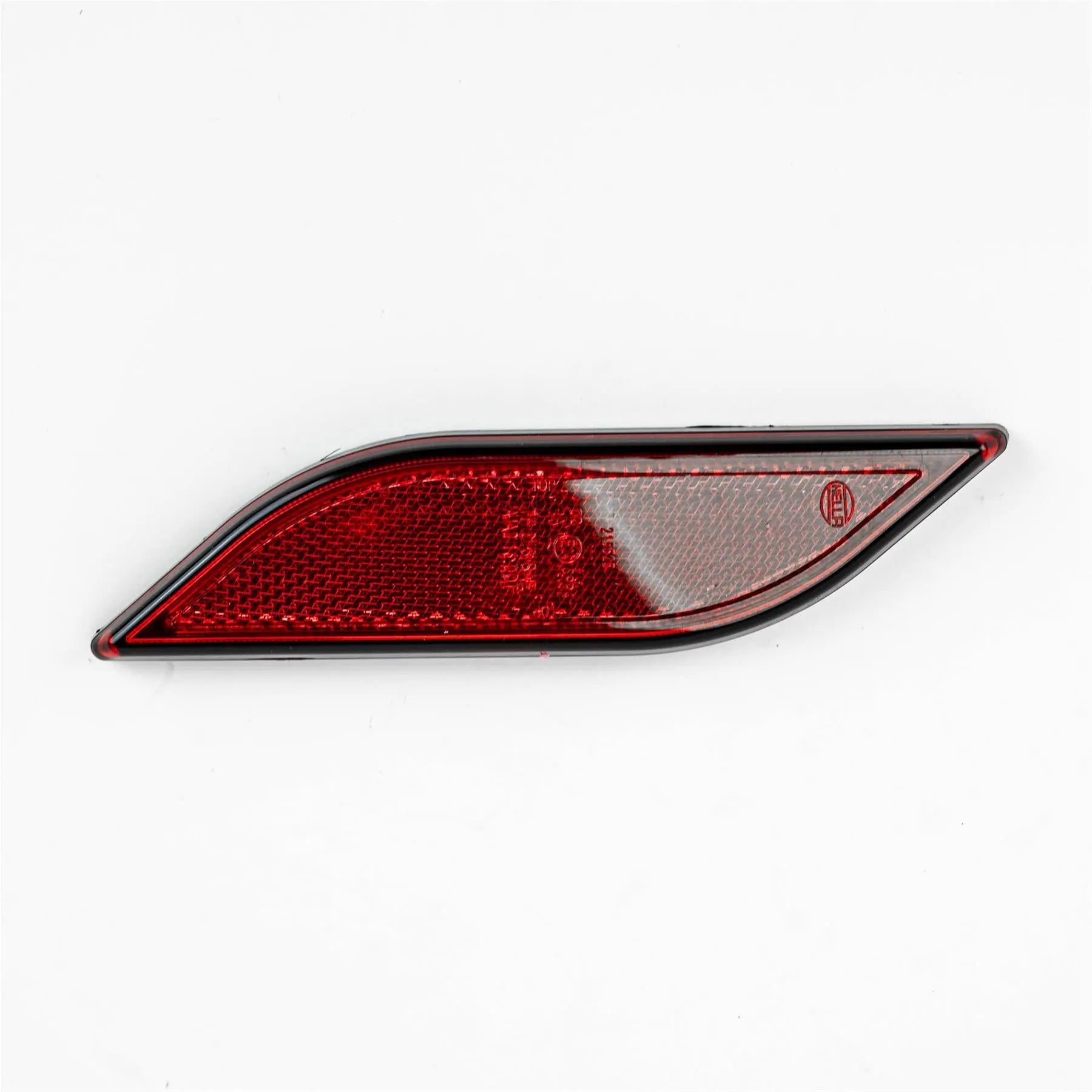 A red nearside Auto-Trail motorhome rear reflector.