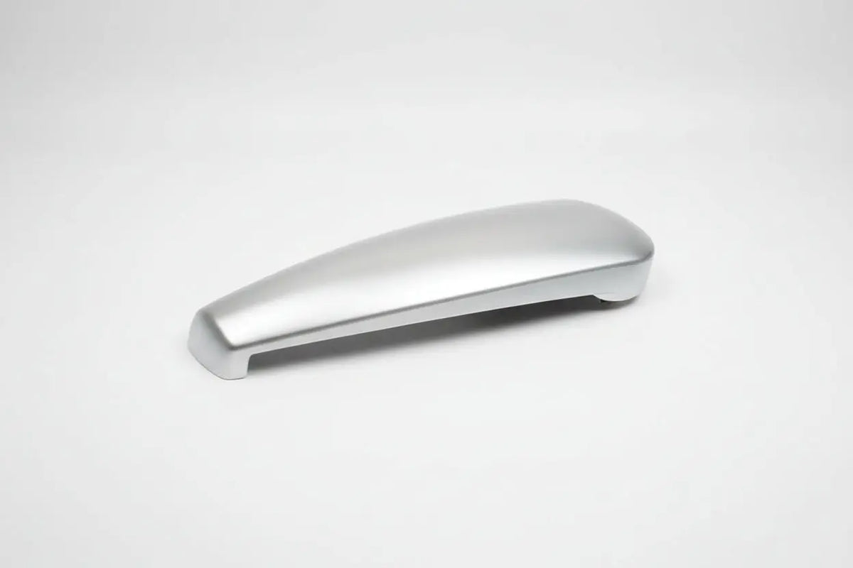 A chrome Auto-Trail motorhome door handle.