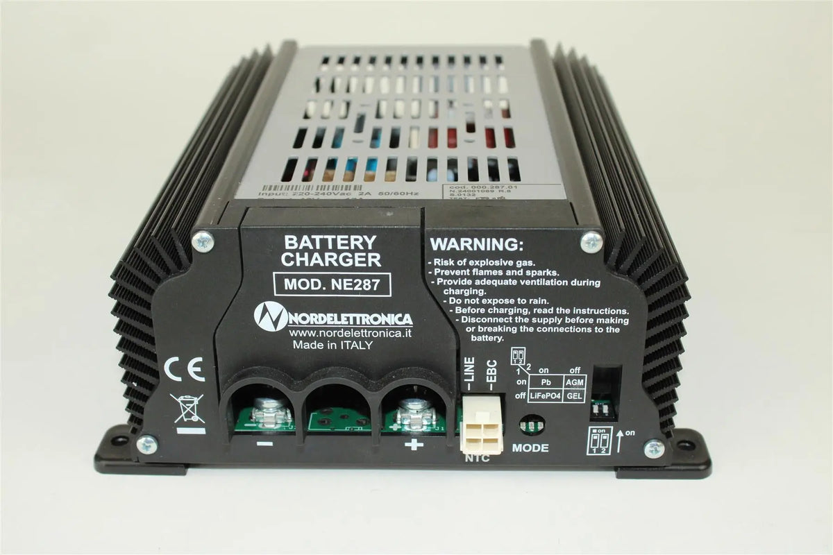 A black Nordelettronica NE287 battery charger for Roller Team motorhomes.