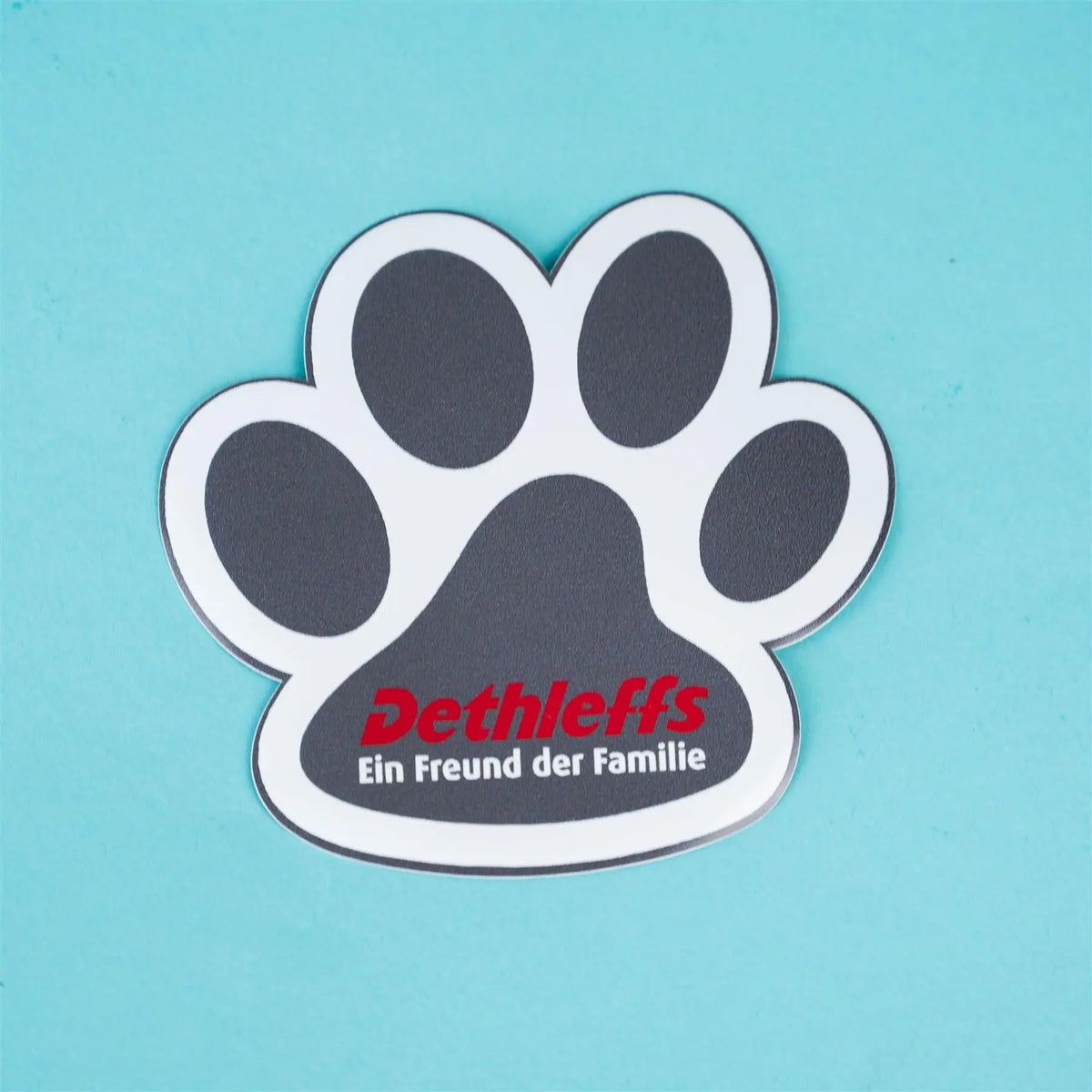 Two black pawprint Dethleffs motorhome vinyl decal stickers.