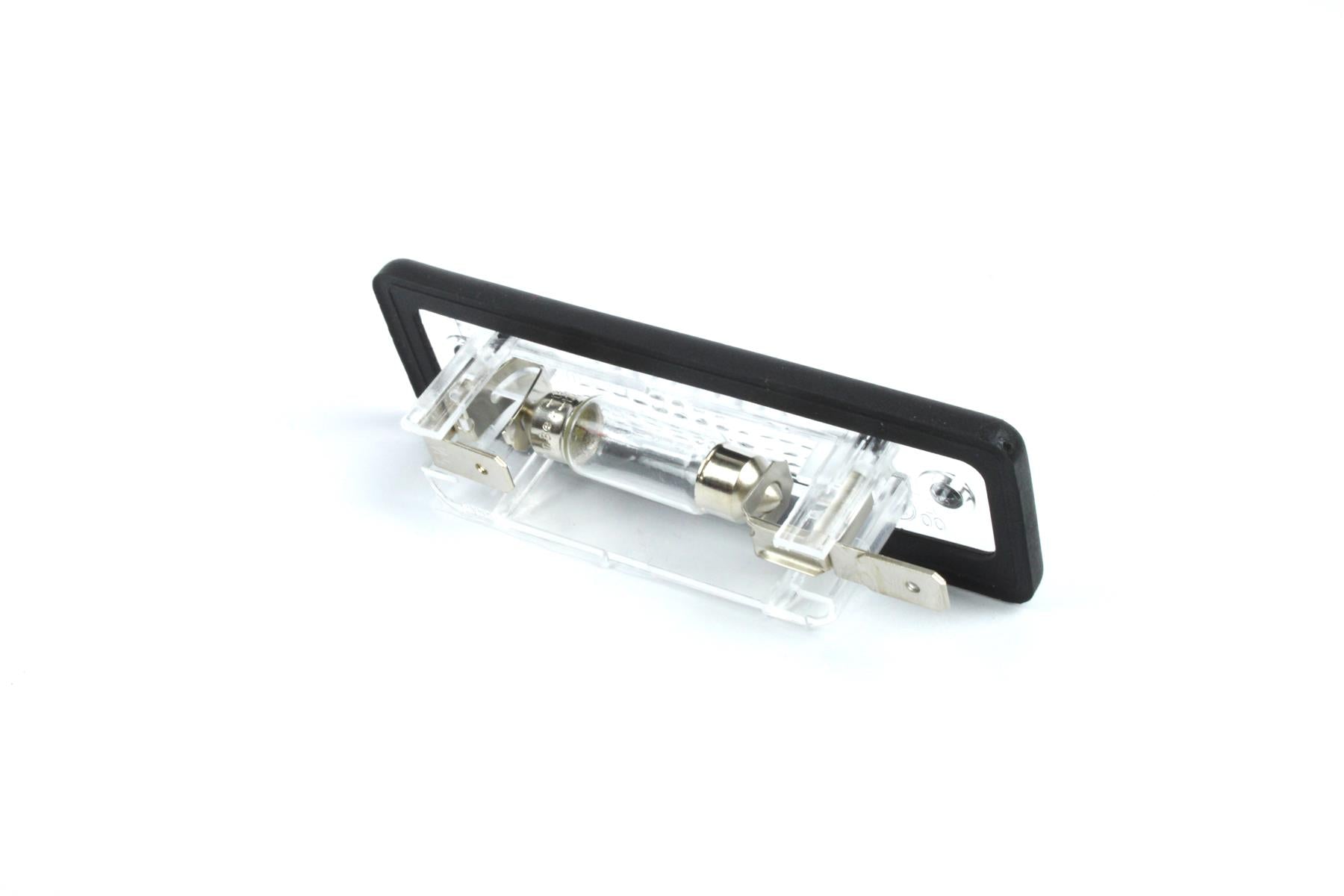 A clear Dethleffs motorhome rear number plate light with a black rim.