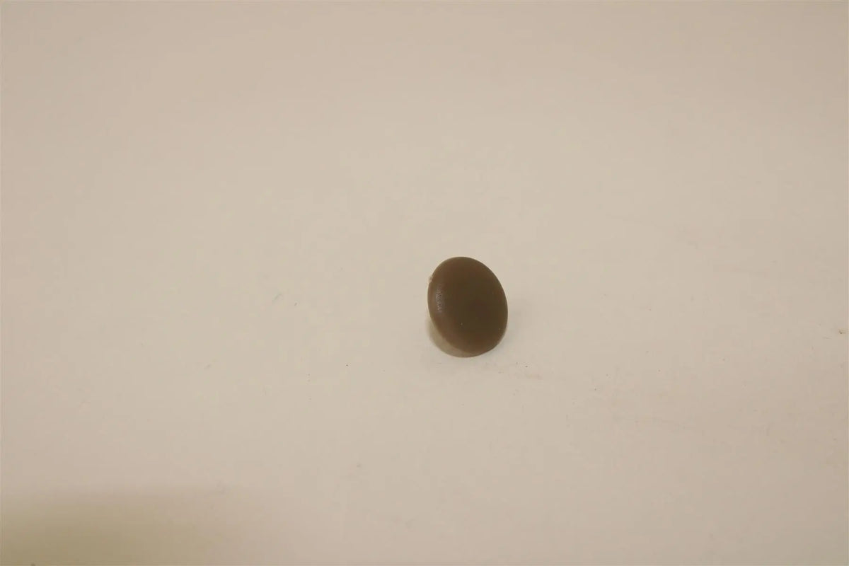 A brown Roller Team motorhome screw cap cover.