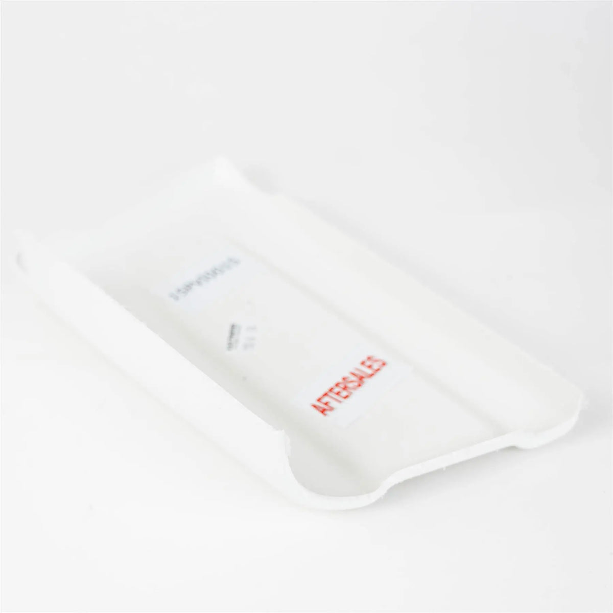 A white AutoQuest motorhome nearside rear skirt cap.