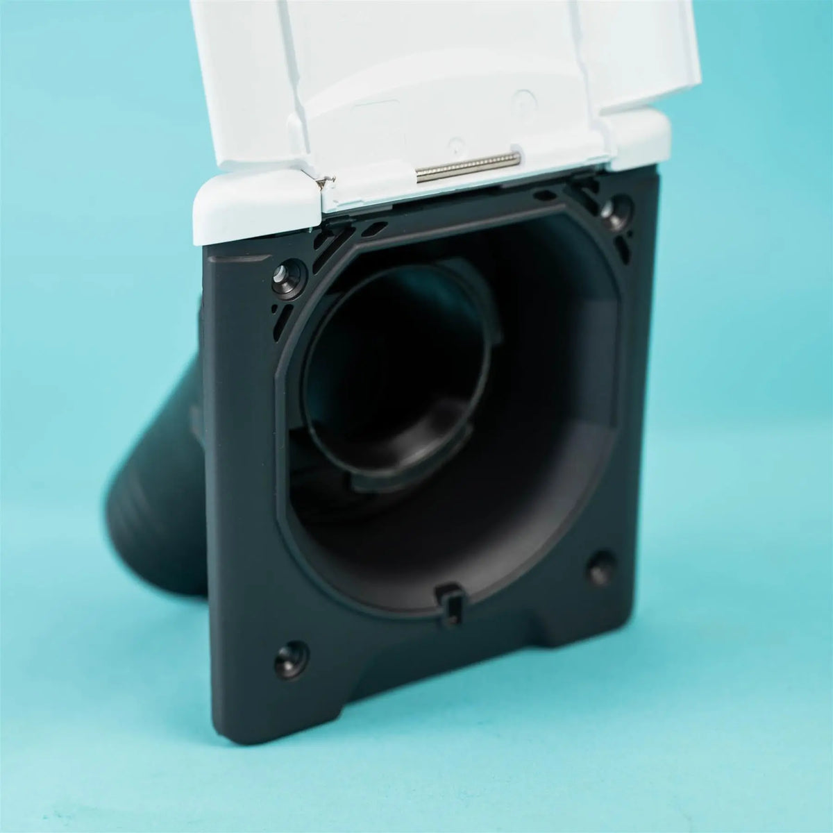 A white Dethleffs motorhome fuel filler housing cap.