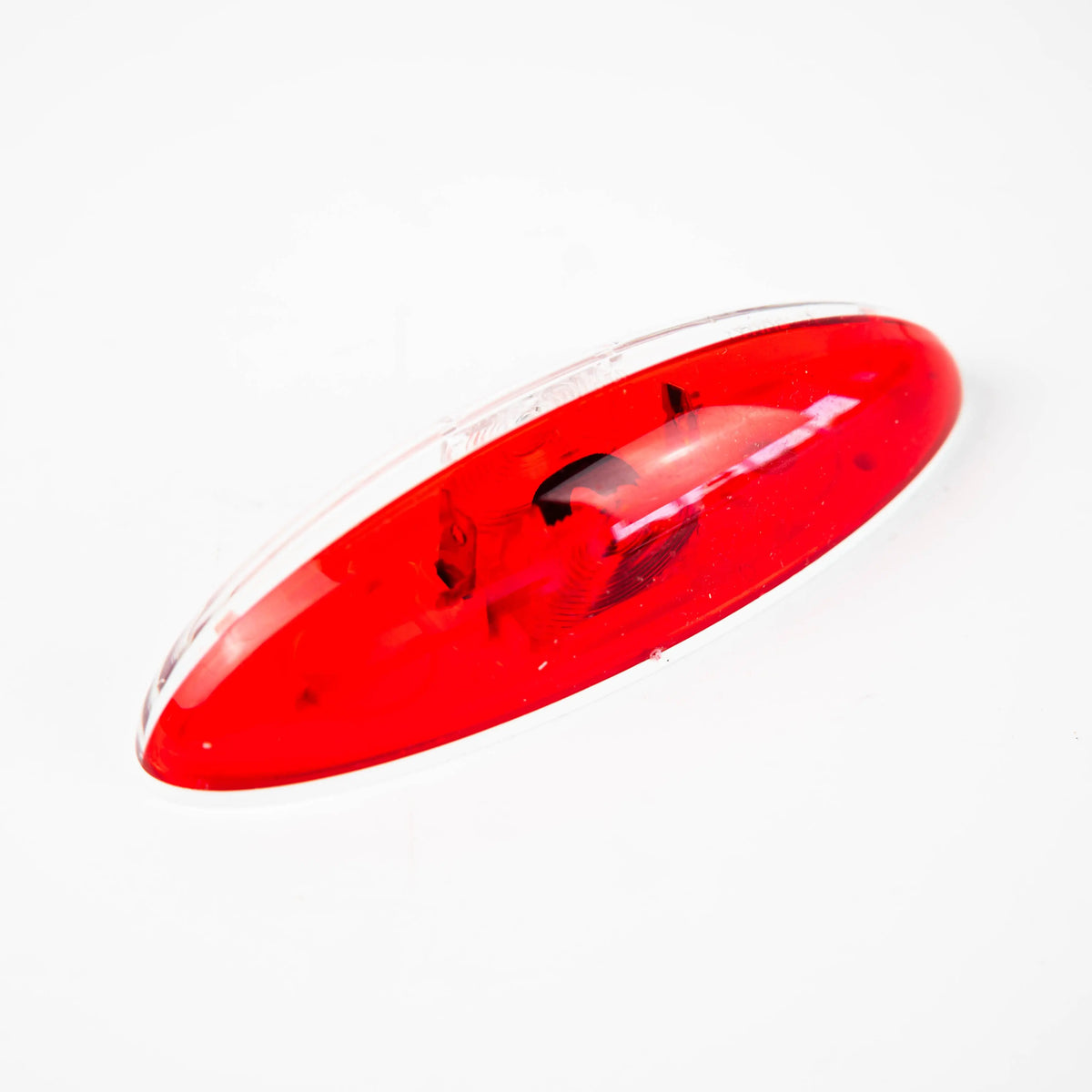 A red Elddis end outline side marker light.
