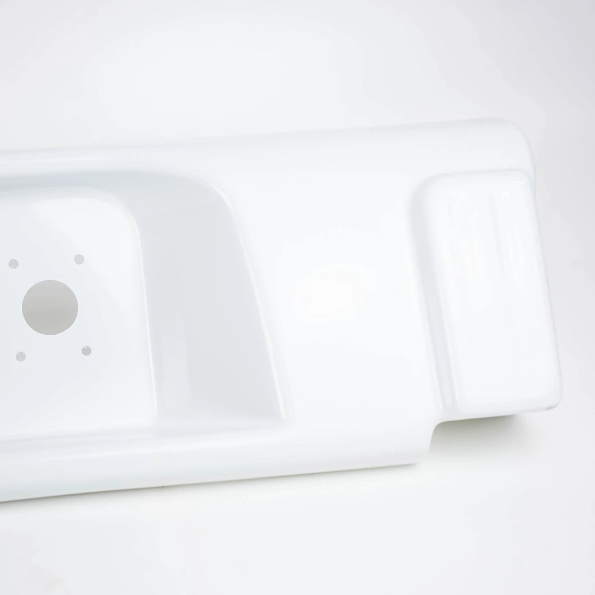 Close up of a white Elddis Autoquest motorhome rear centre bumper panel.
