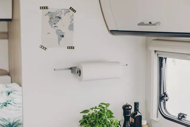 A brushed stainless steel Sunlight motorhome kitchen roll holder.