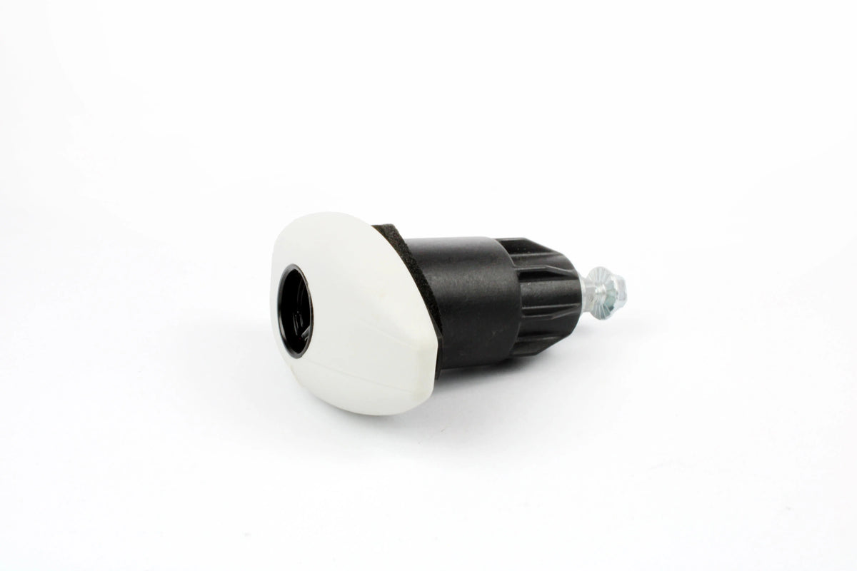 A white Roller Team motorhome locker door handle.
