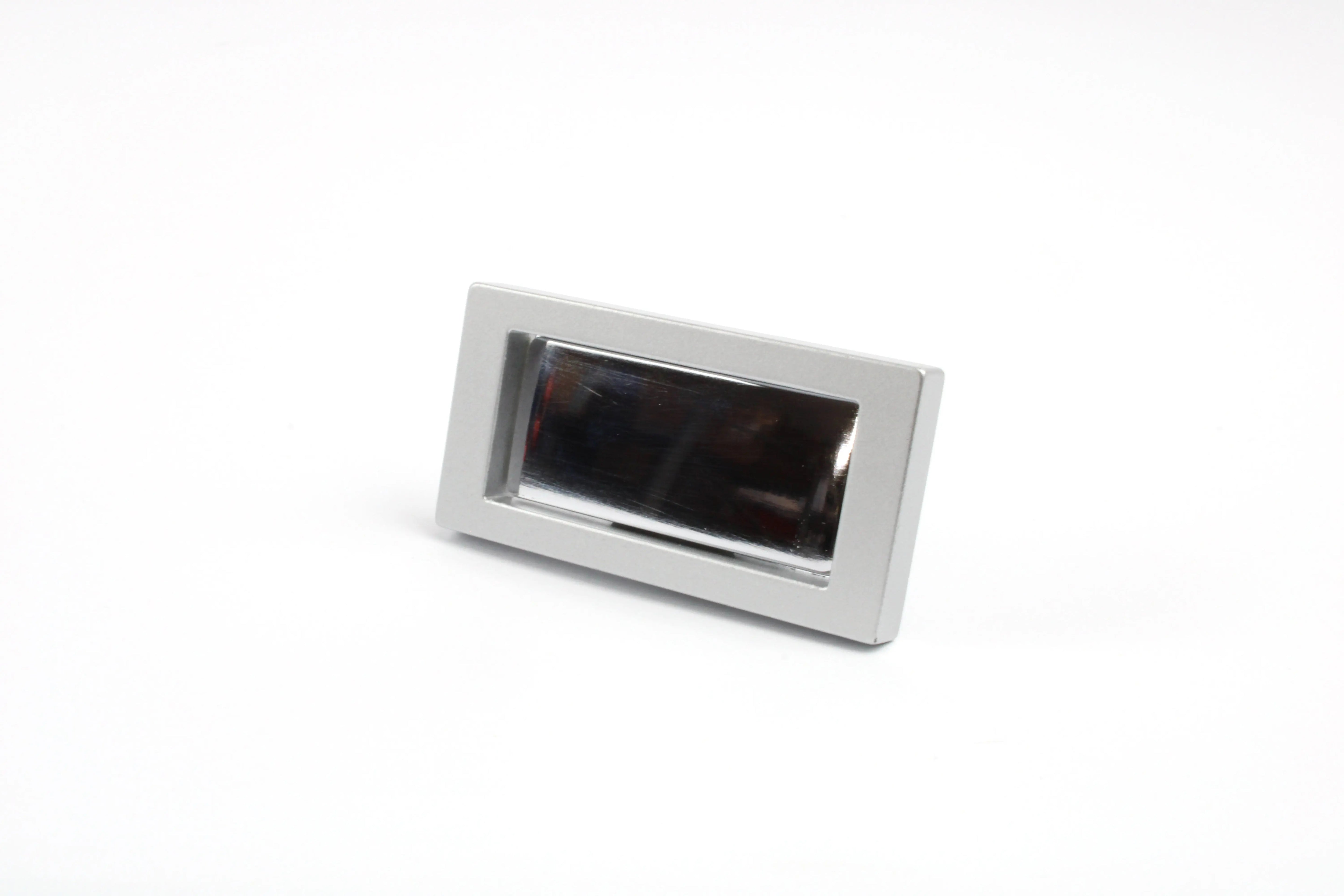 A metal Auto-Trail motorhome locker catch on a white background
