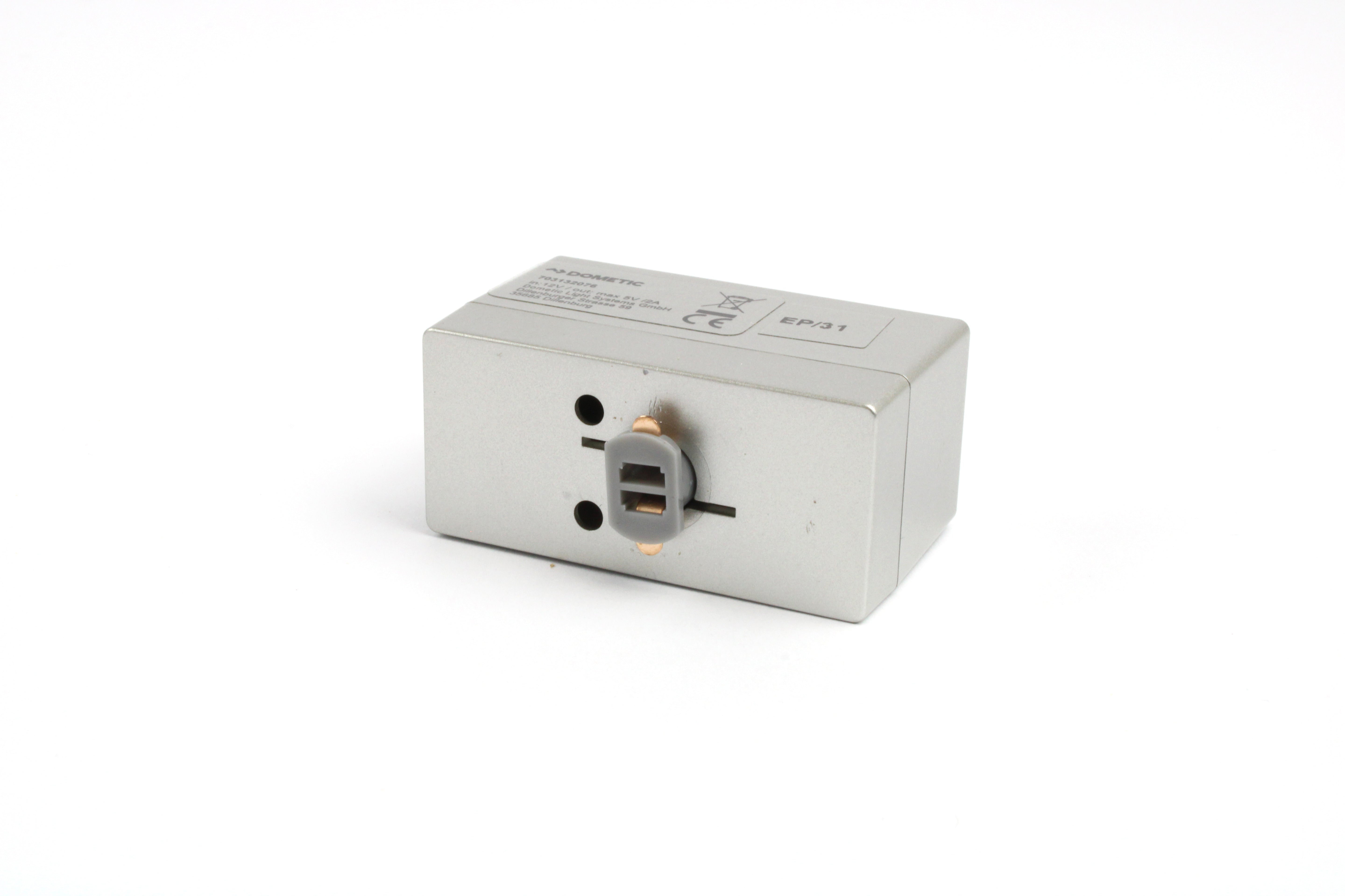 Metallic USB socket on a white background