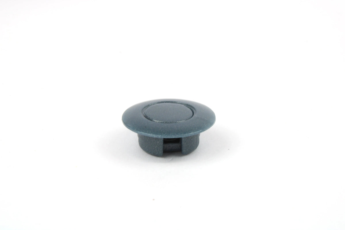 A grey Roller Team motorhome decorative screw cap cover.