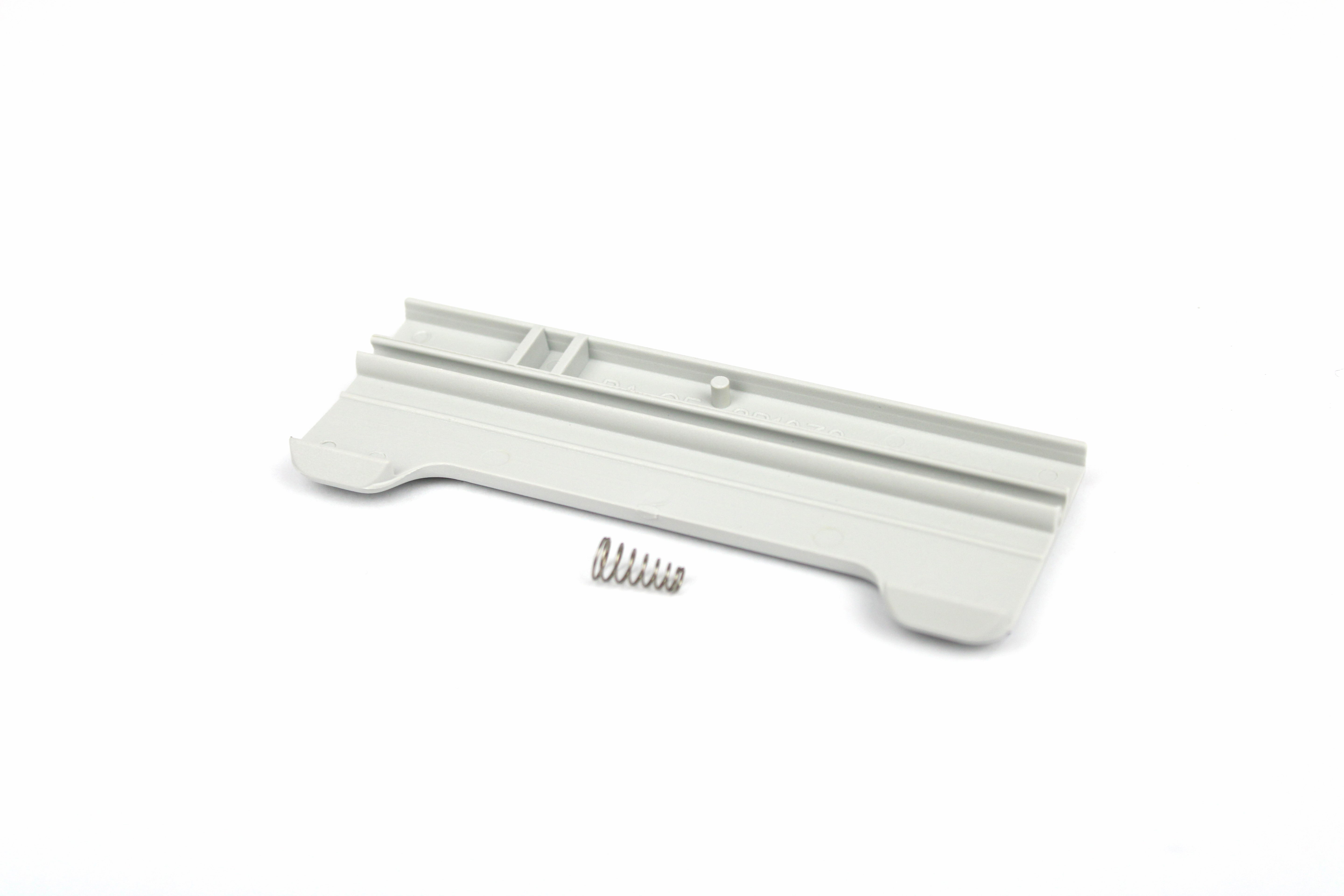 A Dometic Seesaw With Spring In Light Grey