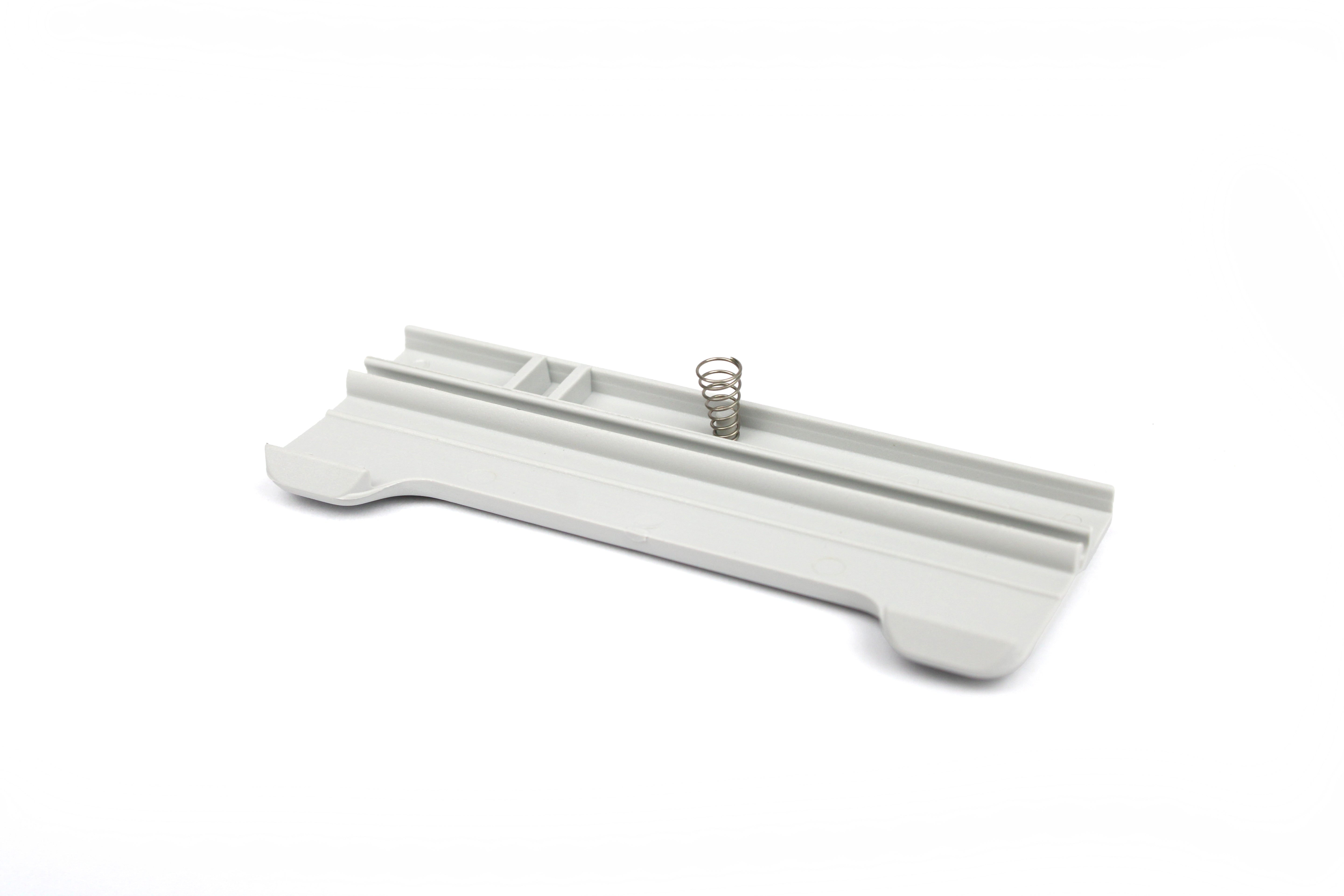 A Dometic Seesaw With Spring In Light Grey