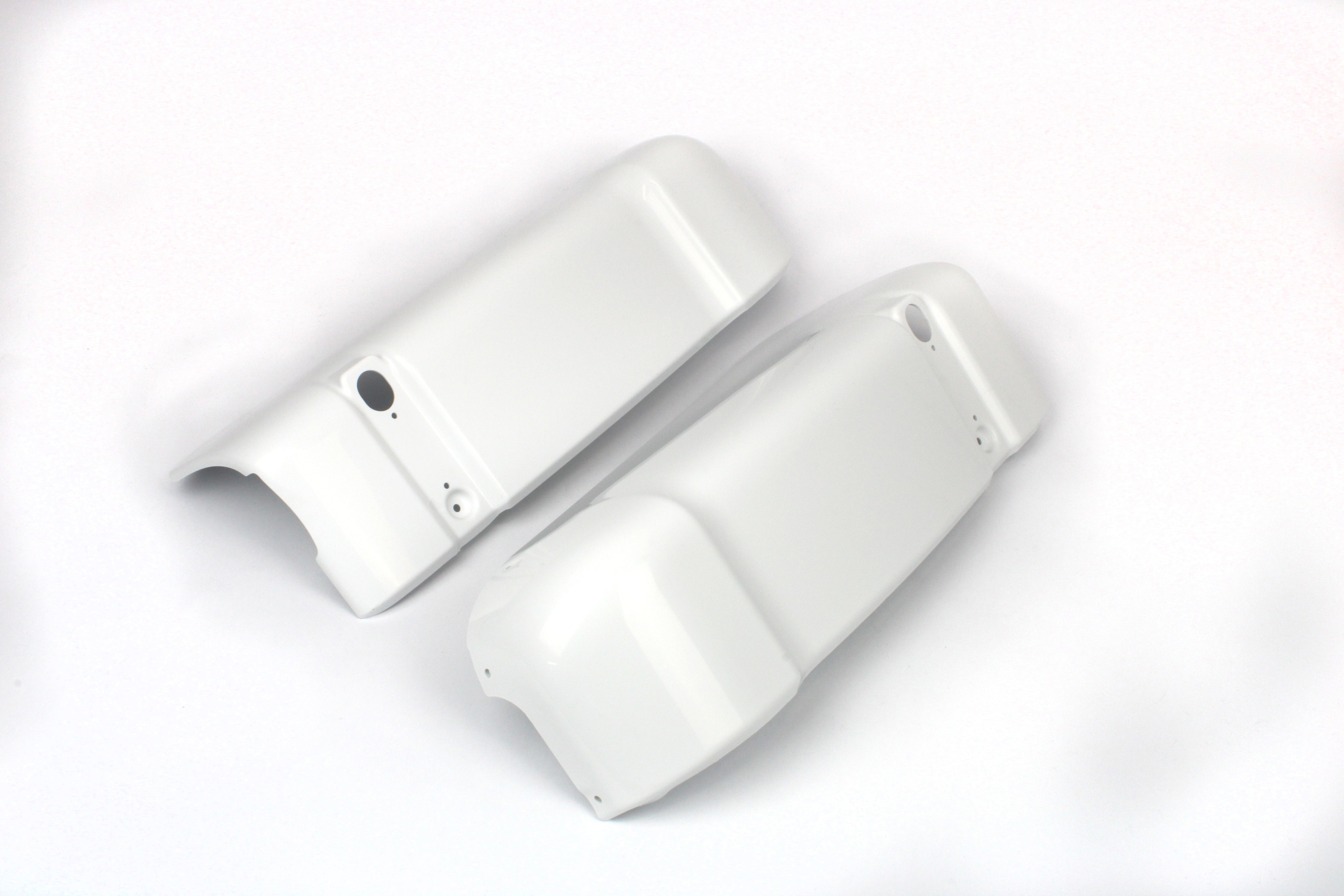 White bumper end caps on a white background