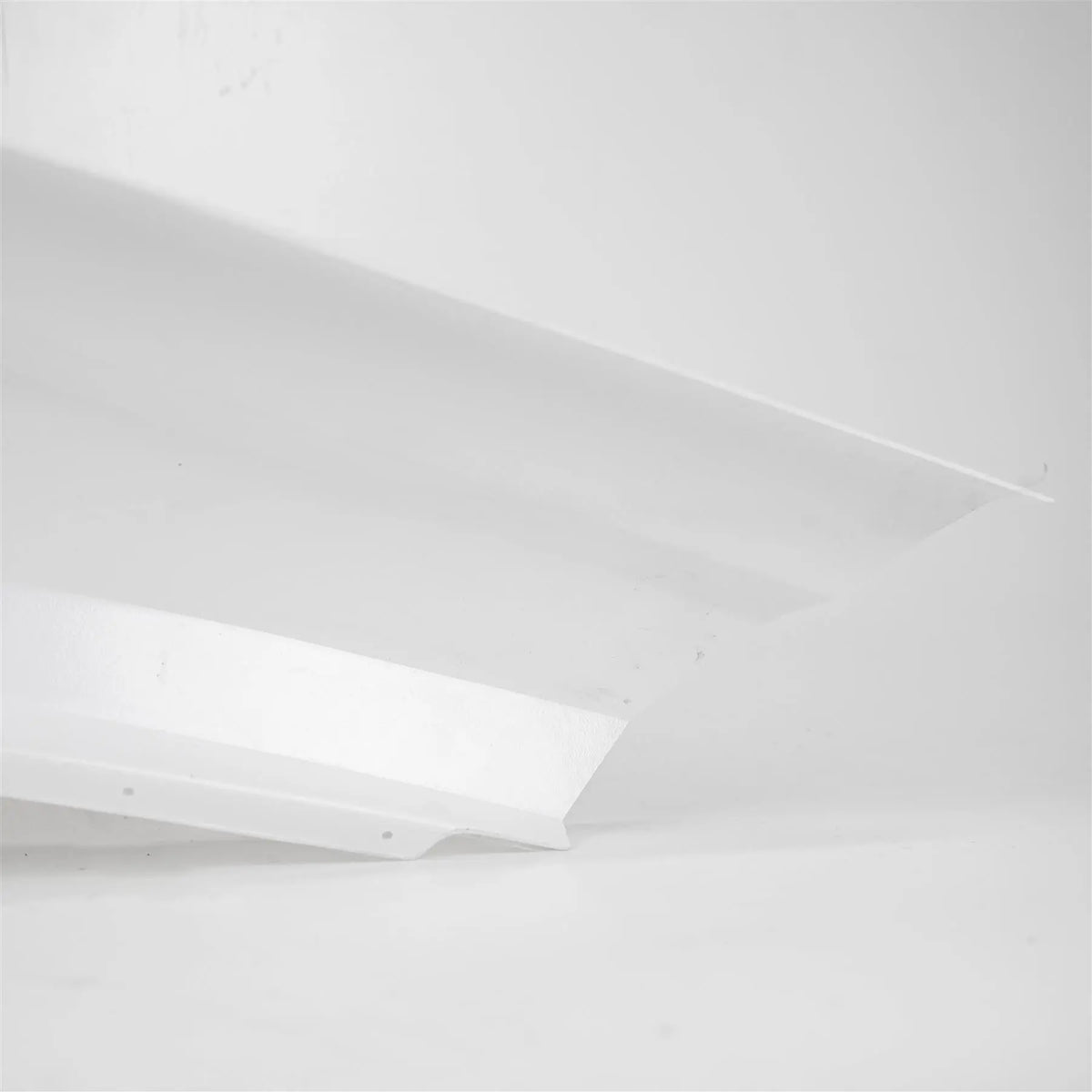 A white Auto-Trail Frontier motorhome nearside bumper.