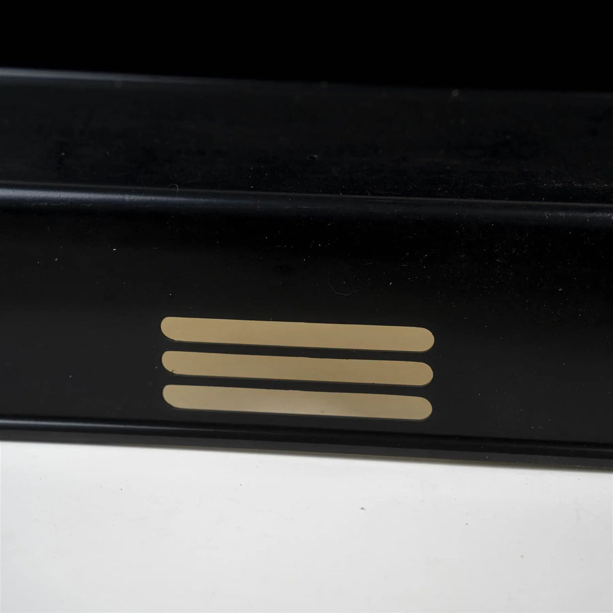 A black Roller Team motorhome access step external cover.