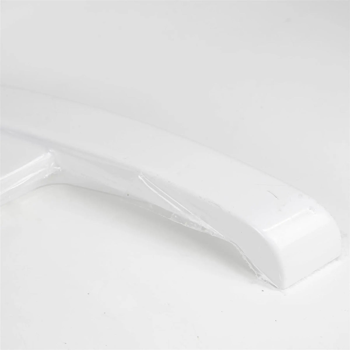A white Elddis Auto Quest motorhome N/S wheel arch - high line.