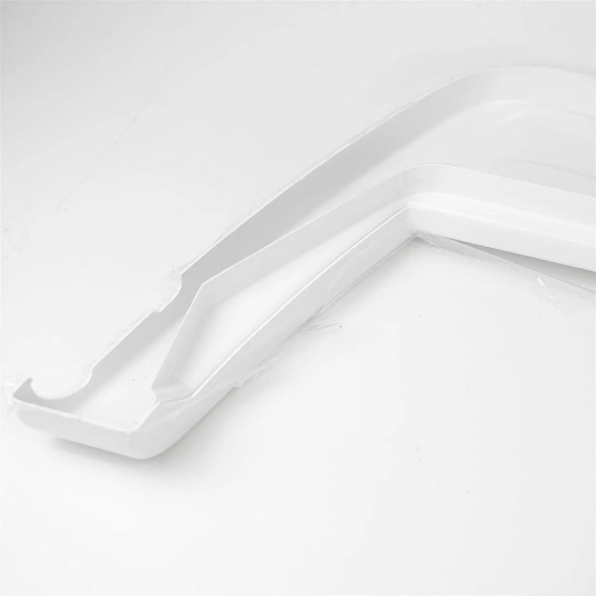 A white Elddis Auto Quest motorhome N/S wheel arch - high line.