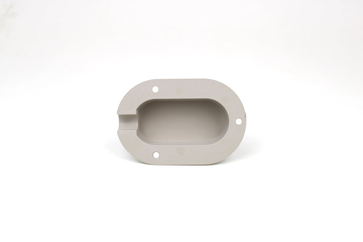 Light grey cable entry cover on white background