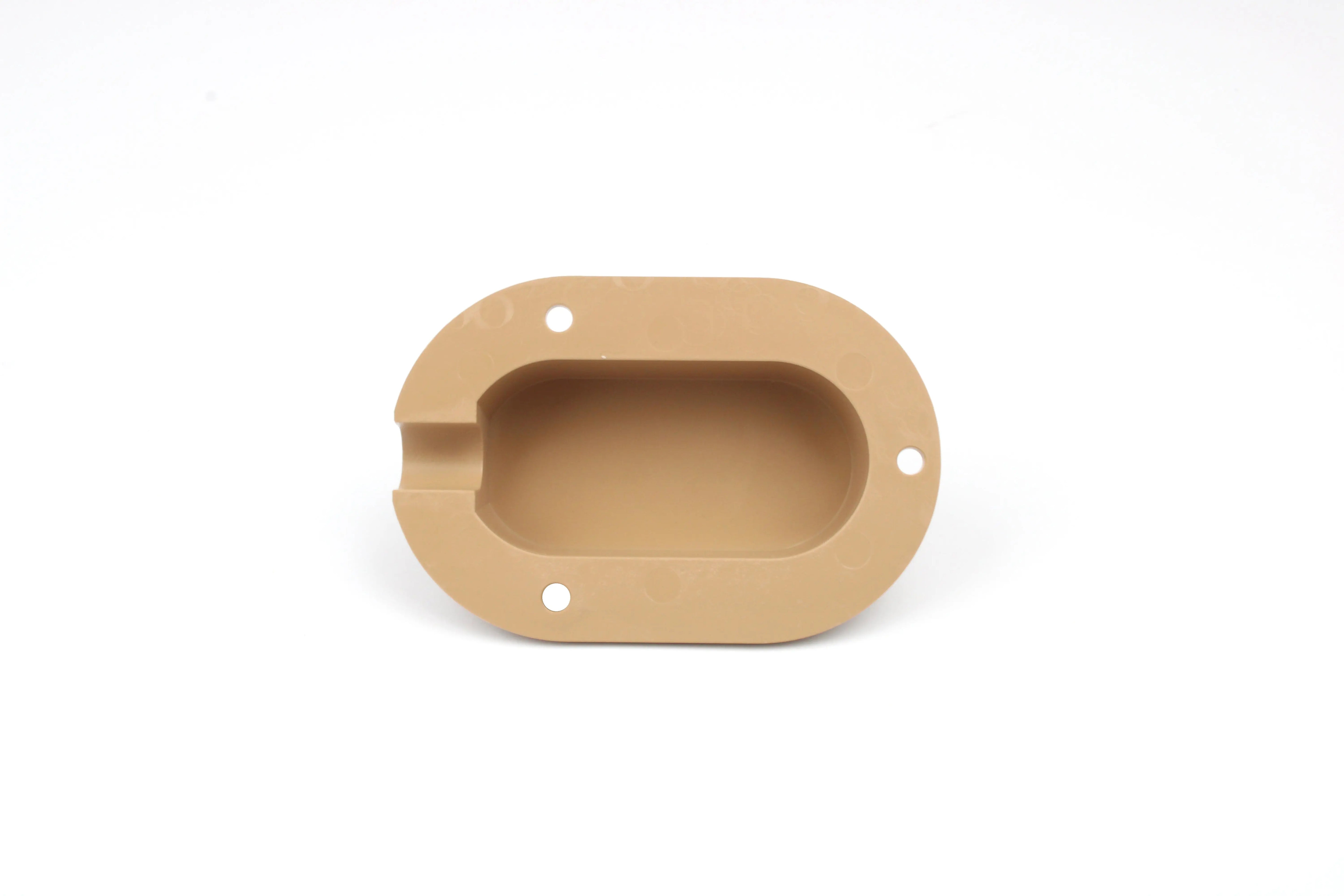Beige cable entry cover on white background