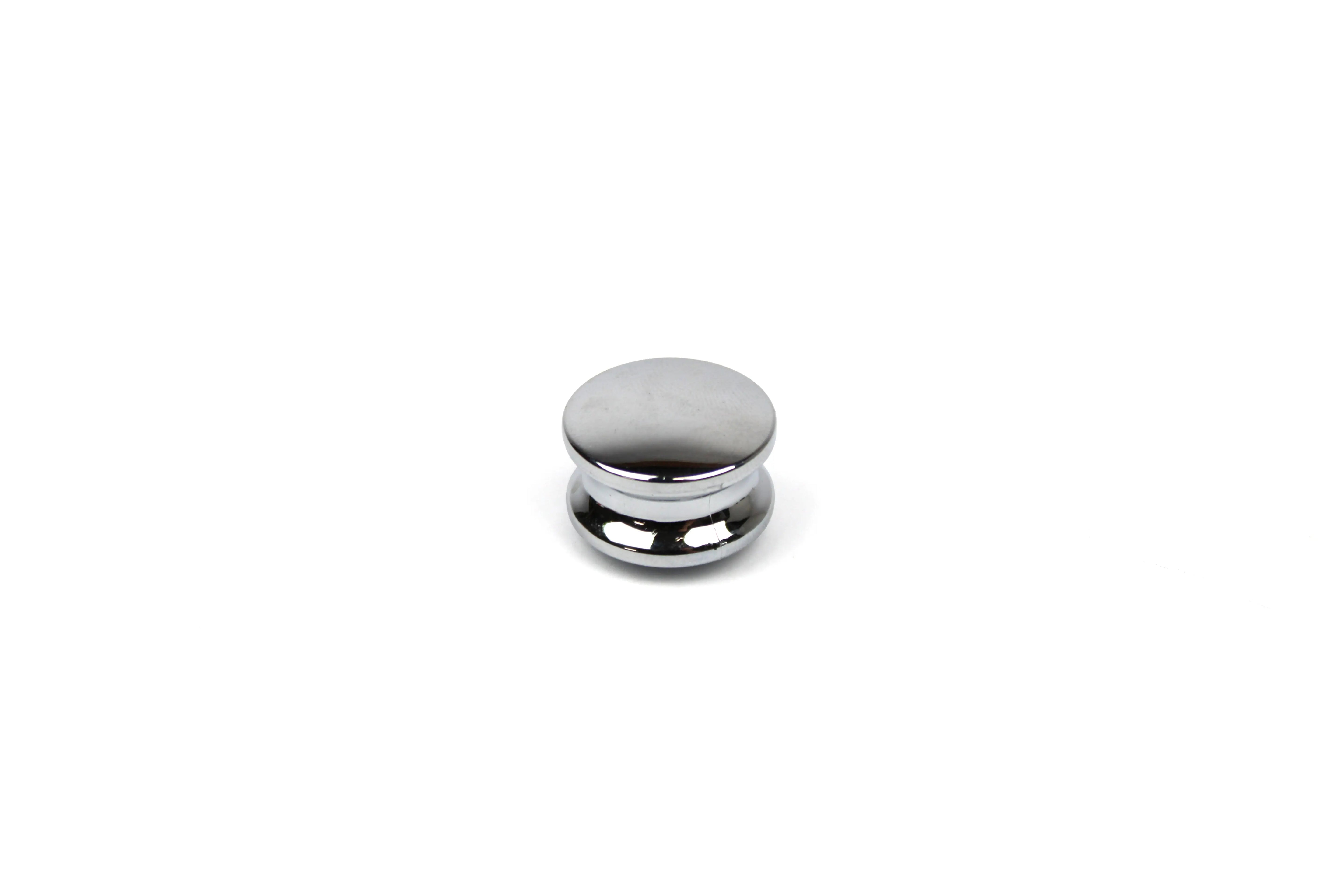 A chrome Auto-Trail motorhome push button knob.