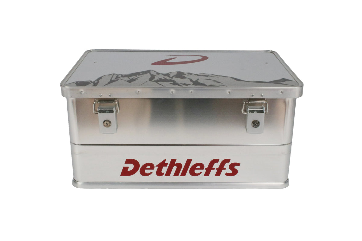An aluminium Dethleffs motorhome storage box with branded stickers.
