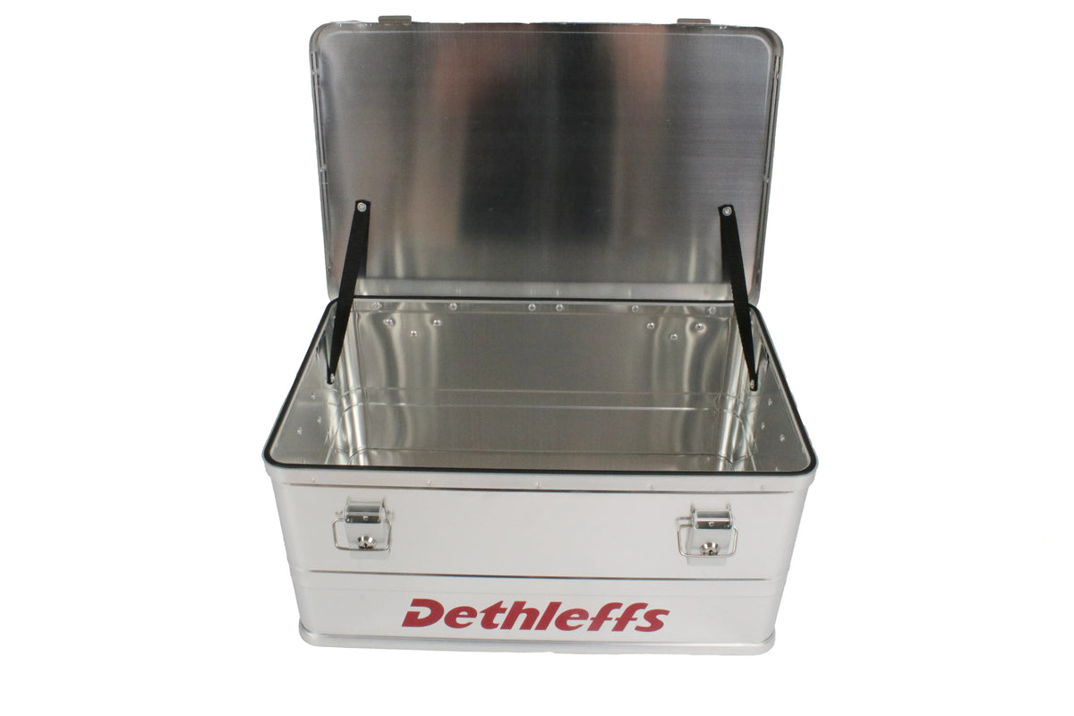 An aluminium Dethleffs motorhome storage box with branded stickers.