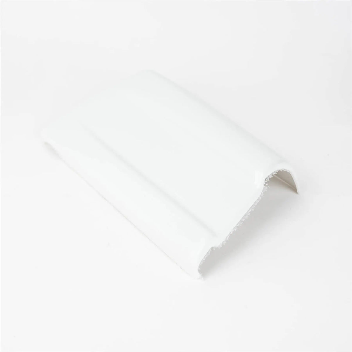A white AutoQuest motorhome nearside rear skirt cap.