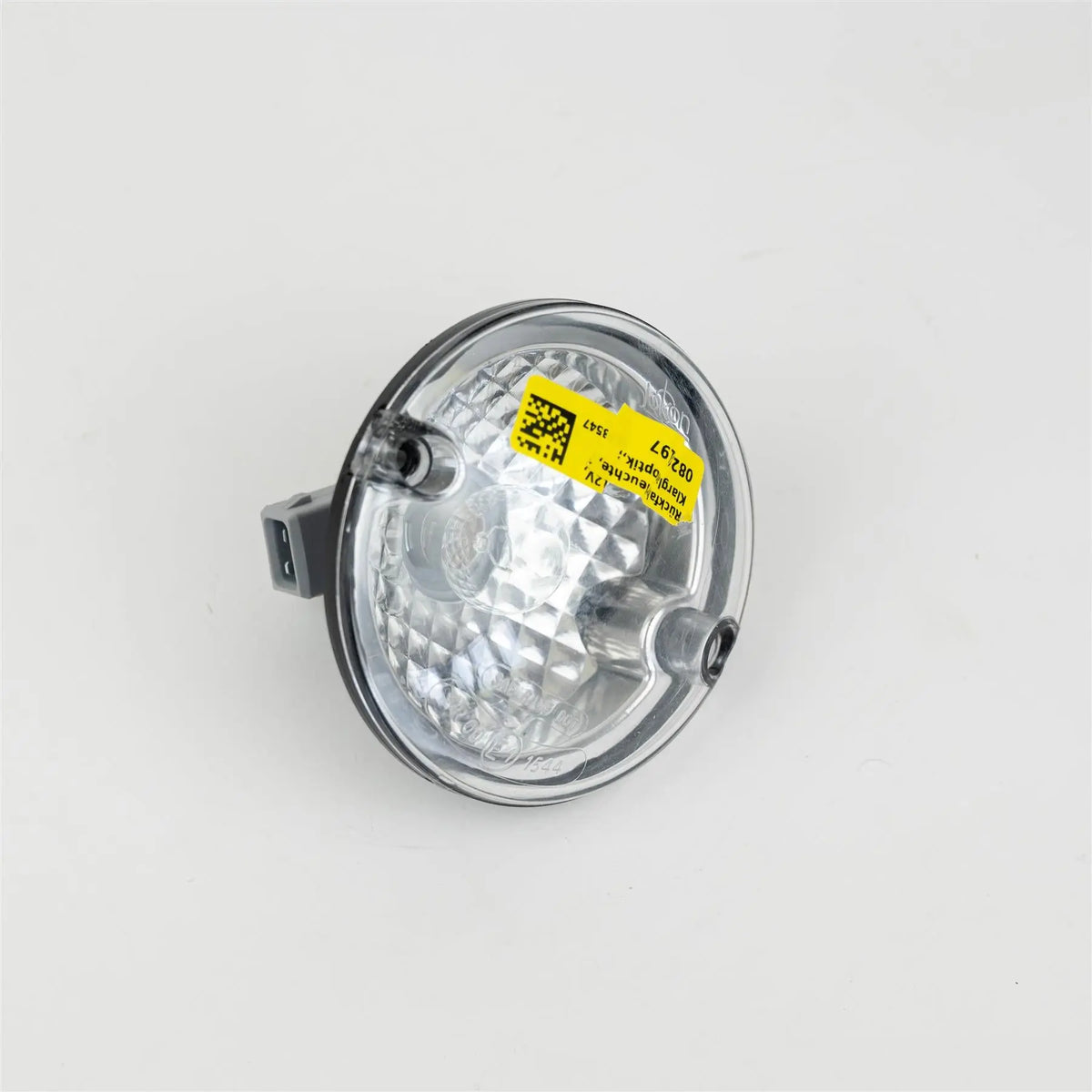A Dethleffs motorhome reverse light with a transparent bulb.