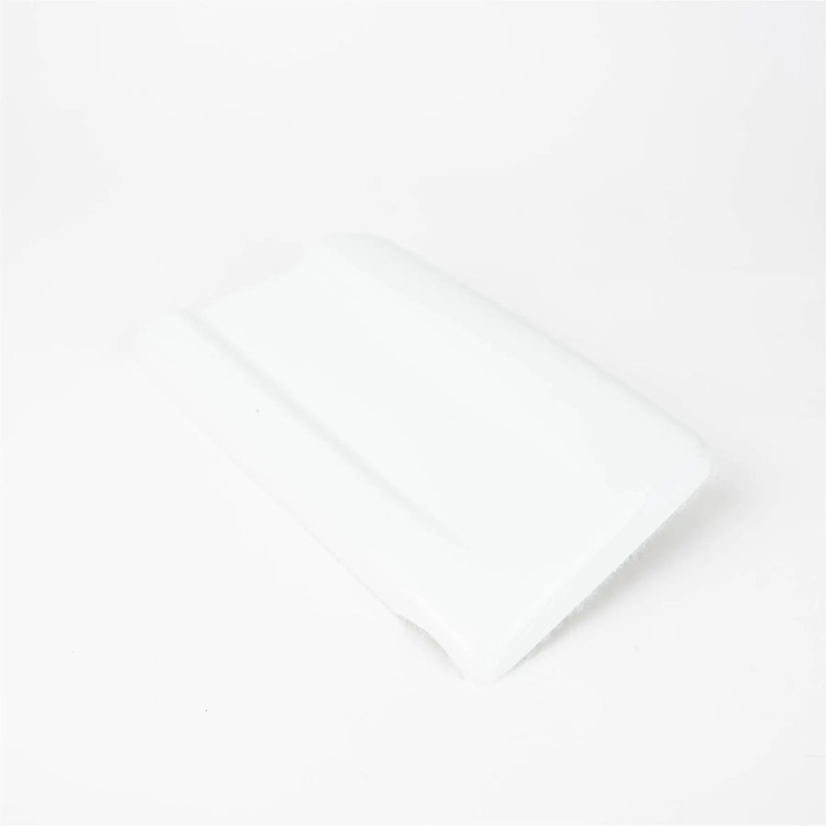 A white Autoquest motorhome offside rear skirt cap.