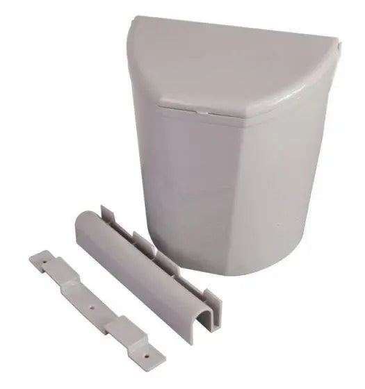 A grey plastic waste bin.