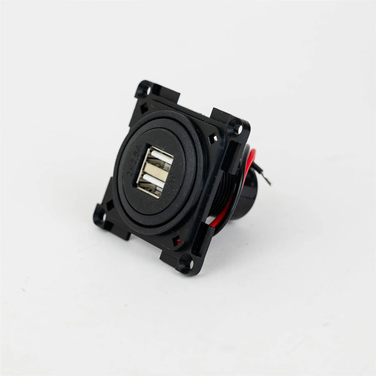 A black Dethleffs motorhome USB socket.