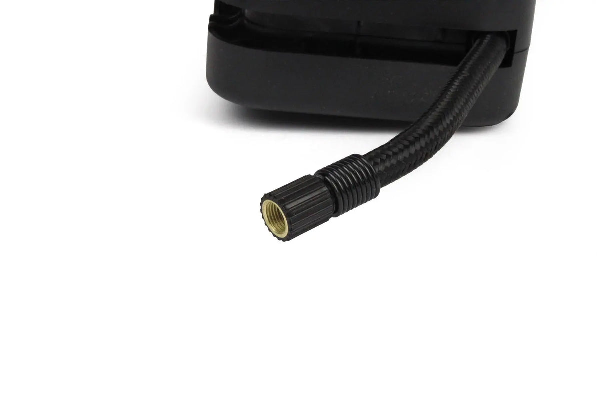 A black AA compact tyre inflator.