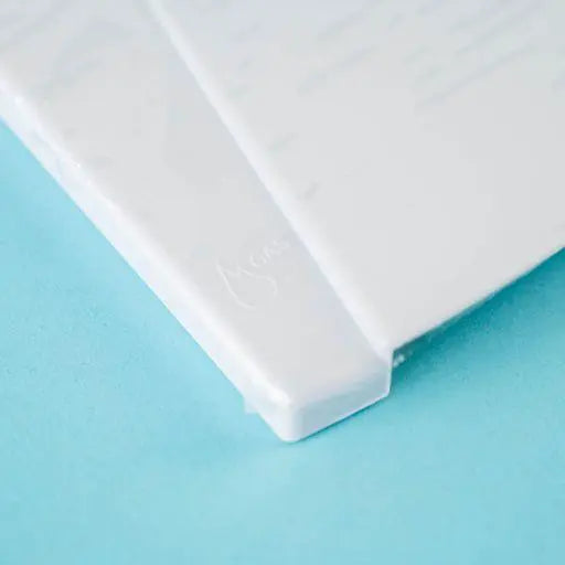 A white Dethleffs motorhome external gas BBQ point cover.