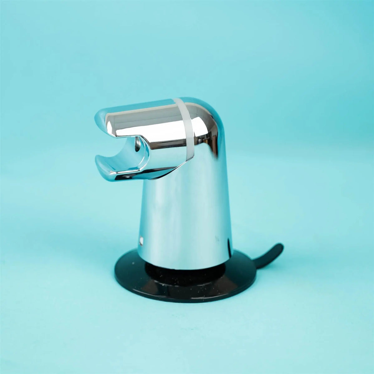 A silver metal Sunlight motorhome shower bracket.