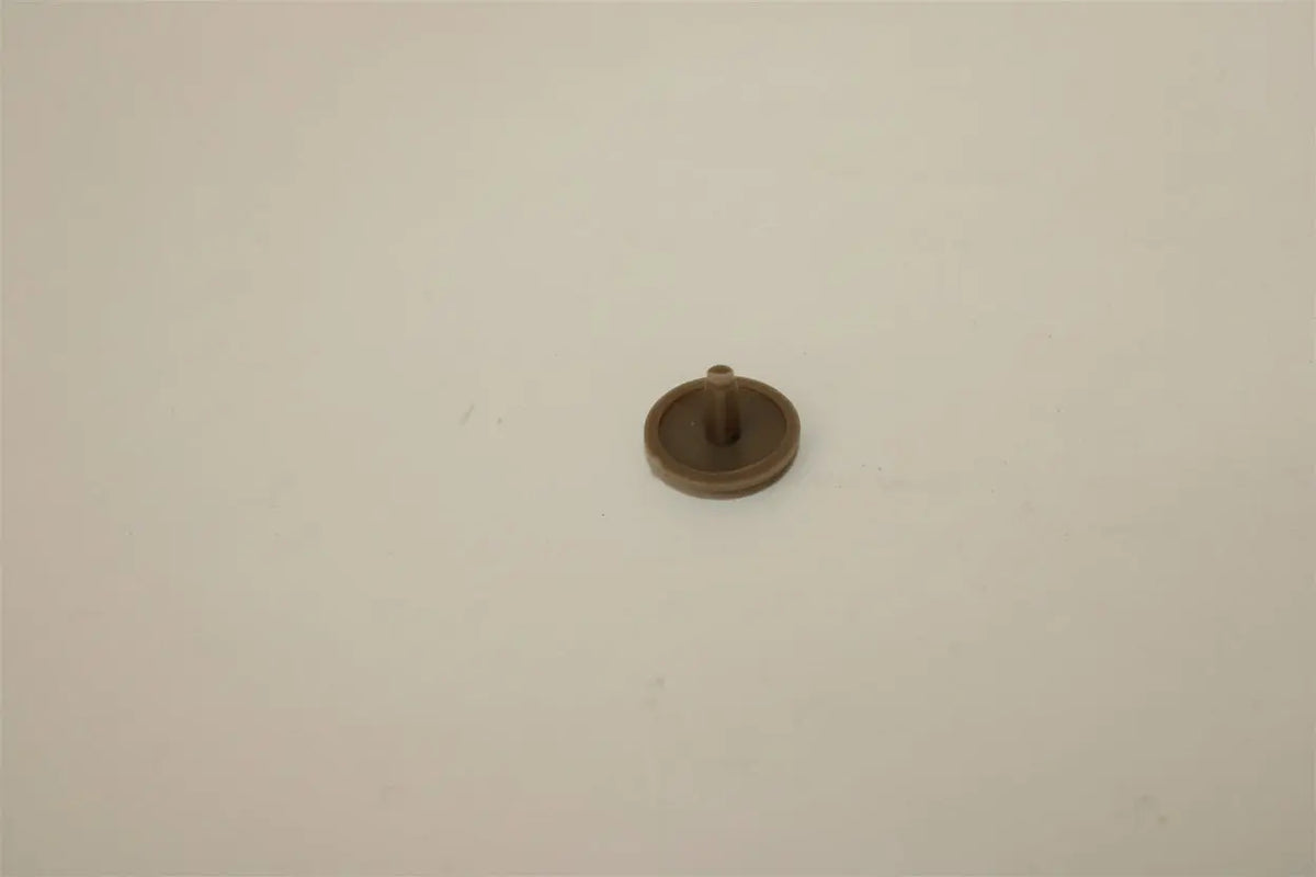 A brown Roller Team motorhome screw cap cover.