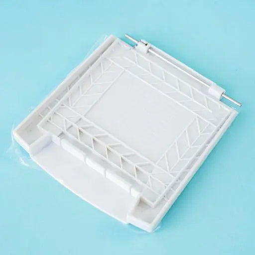 A white Dethleffs motorhome external gas BBQ point cover.