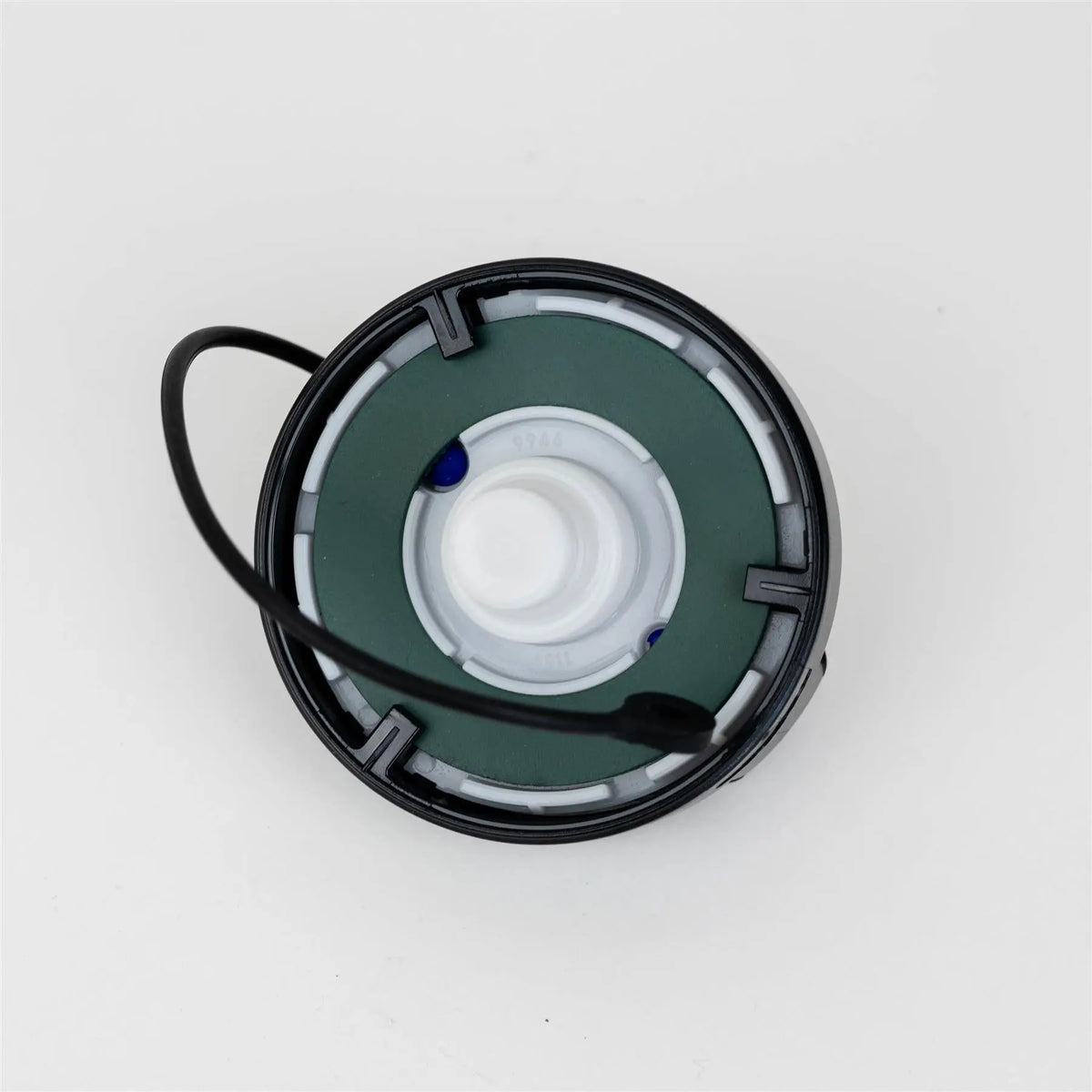 A black Dethleffs motorhome tank cap.