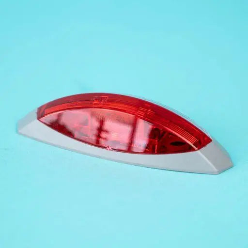 A red Dethleffs motorhome outerside side marker light.