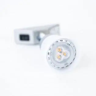A white Dethleffs and Sunlight motorhome spot light.