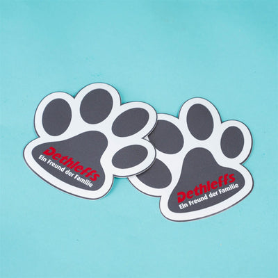 Two black pawprint Dethleffs motorhome vinyl decal stickers.