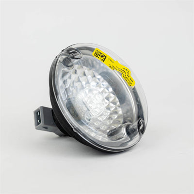 A Dethleffs motorhome reverse light with a transparent bulb.