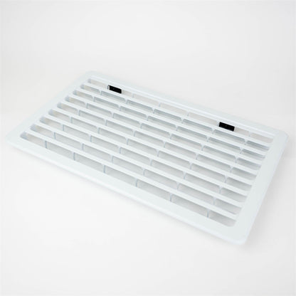 A white Dethleffs motorhome Thetford fridge ventilation grille.