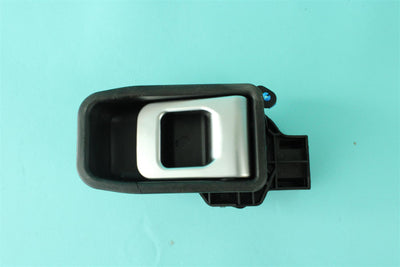 A black and chrome Roller Team motorhome internal door handle.